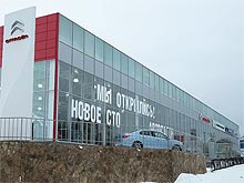 В следующем году налогом на недвижимость обложат автосалоны и СТО
