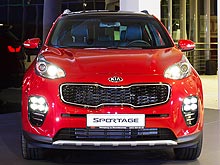    Kia Sportage      - Kia