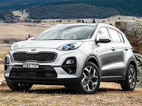 Kia Sportage        - Kia