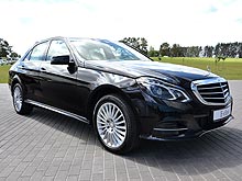      Mercedes-Benz E-.   