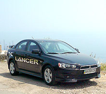 -:  Mitsubishi Lancer X