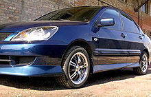   ѻ  Mitsubishi Lancer