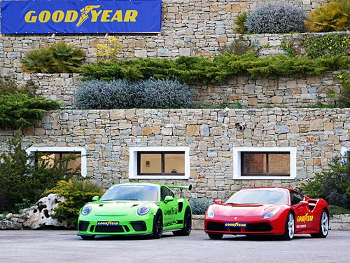      Ferrari  Porsche.    Goodyear