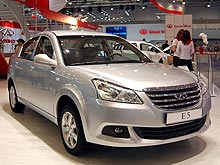Chery E5      - 157 900 .