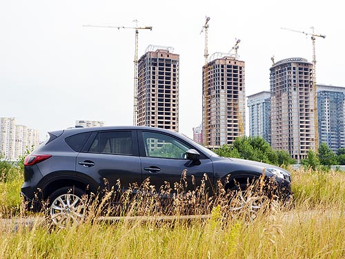  -: Nissan Qashqai New vs Mazda CX-5.    