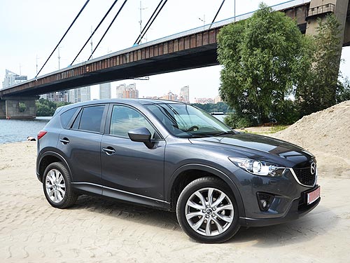  -: Nissan Qashqai New vs Mazda CX-5.    