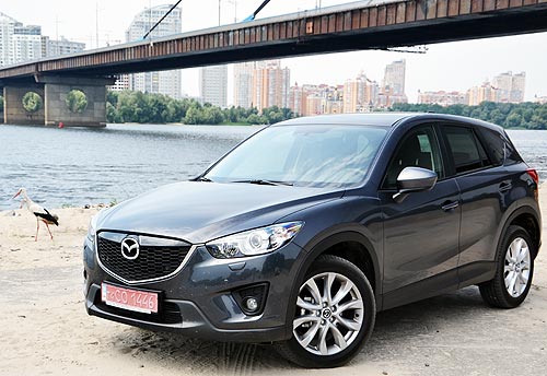   Mazda CX-5.  BMW