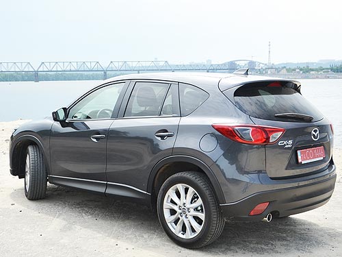  -: Nissan Qashqai New vs Mazda CX-5.    