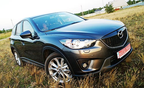  -: Nissan Qashqai New vs Mazda CX-5.    